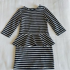 H&M navy & white long sleeved peplum dress with gold zipper. Size 4-6.